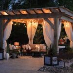 Patio - photo of gazebo with curtain and string lights