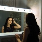 Mirror In Wardrobe - woman wearing black sleeveless top