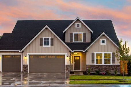 Real Estate - Brown and Gray Painted House in Front of Road