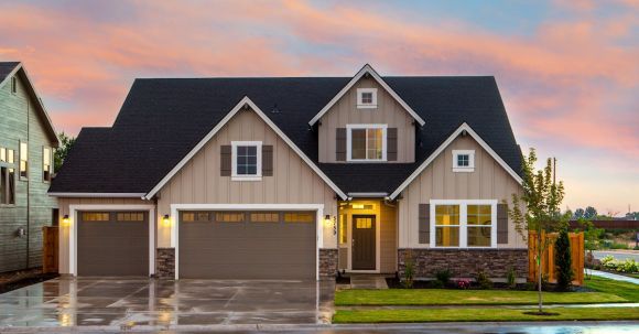 Real Estate - Brown and Gray Painted House in Front of Road