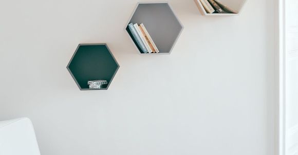 Interior Design - Wooden White Armchair Beside a Small Round Table