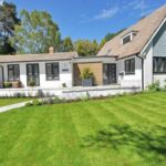 Real Estate - White Wooden 2-storey House Near Tree