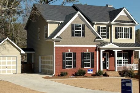 Real Estate - White Grey and Red Wooden House