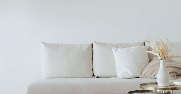 Interior Design - White Couch on Wooden Floor