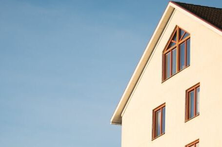 Property - Beige Concrete House Under Cumulus Cloud