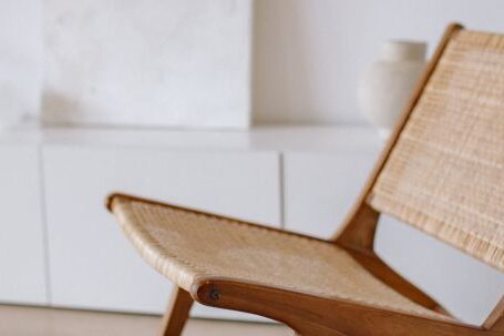 Interior Design - Slippers Near a Wooden Chair