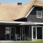 Property - Black and Brown Wooden House