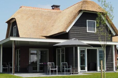 Property - Black and Brown Wooden House