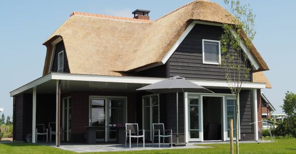 Property - Black and Brown Wooden House