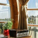 Interior Design - Black Music Player on Brown Wooden Desk