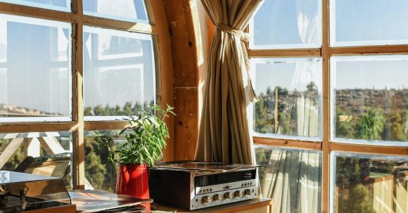 Interior Design - Black Music Player on Brown Wooden Desk