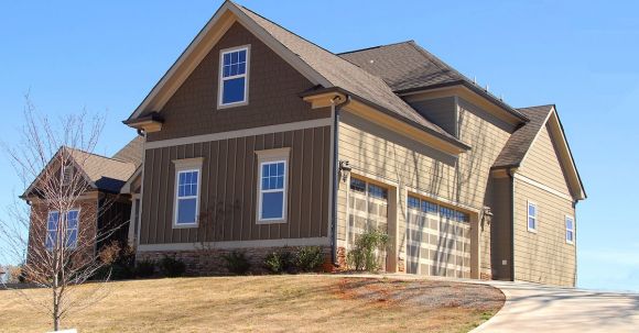 Property - Brown and Beige Wooden House Under Blue Sky