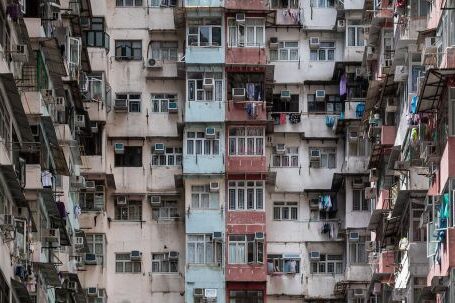 Property - Photo of Brown, Red, and White Buildings