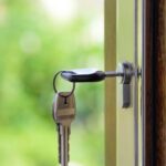 Real Estate - Black Handled Key on Key Hole