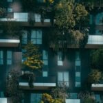 Property - Modern residential building facade decorated with green plants