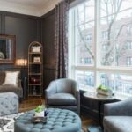 Real Estate - Round Tufted Gray Ottoman