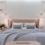 Luxury Properties - Bedroom interior with bed near table under lamps