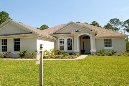 Real Estate - White and Brown Concrete Bungalow Under Clear Blue Sky