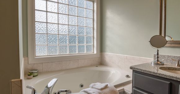 Real Estate - White Ceramic Bathtub Near White Ceramic Bathtub
