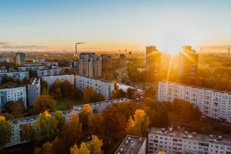 Real Estate - Aerial View of White Concrete Buildings during Golden Hours