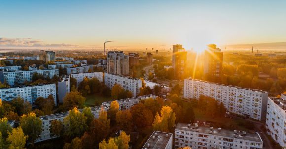 Real Estate - Aerial View of White Concrete Buildings during Golden Hours