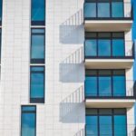 Real Estate - Low-angle Photography of Gray Concrete Building