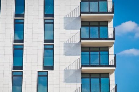 Real Estate - Low-angle Photography of Gray Concrete Building