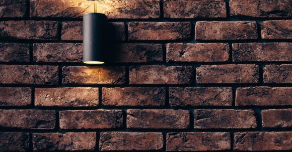 Real Estate - Tubular Black Sconce