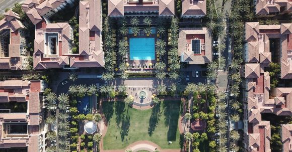 Real Estate - Brown Concrete Houses and Green Leafed Trees