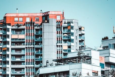 Property - Low Angle Photography of White High-rise Building