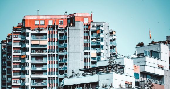 Property - Low Angle Photography of White High-rise Building