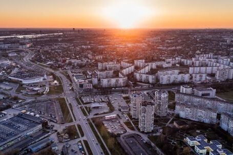 Real Estate - Aerial Photo of High Rise Building during Sunrise