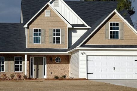 Real Estate - Brown and White Wooden House