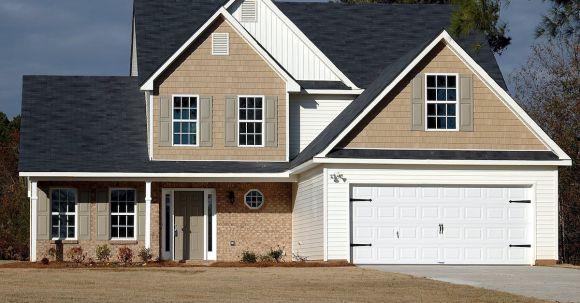 Real Estate - Brown and White Wooden House