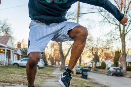 Neighborhood - Man Doing Skateboard Stunt