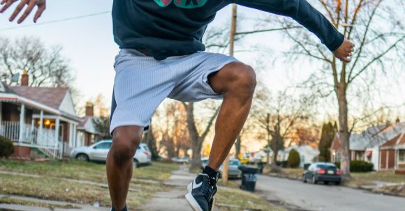 Neighborhood - Man Doing Skateboard Stunt