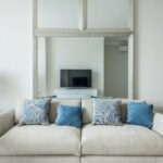 Luxury Properties - Sofa with cushions in living room