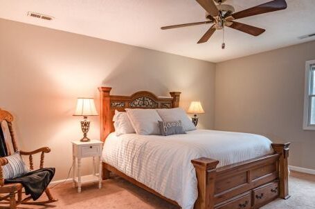 Ceiling Fan - White Bed Linen on Bed
