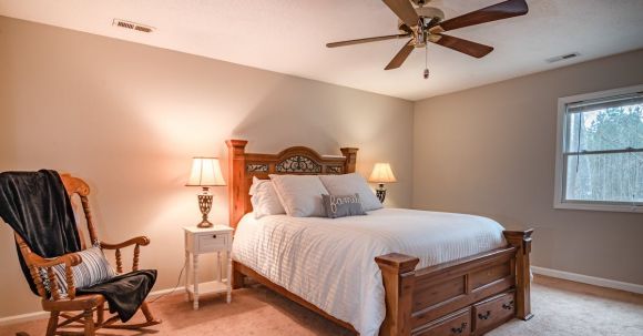 Ceiling Fan - White Bed Linen on Bed
