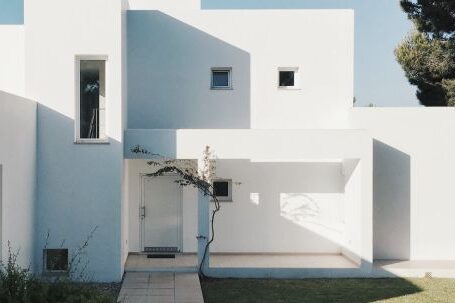 House - White 2-storey House Near Trees