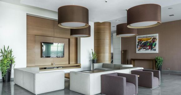 Luxury Properties - Spacious living room in modern apartment