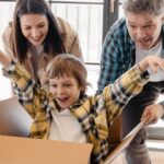 New Home - Kid Having Fun inside the Box