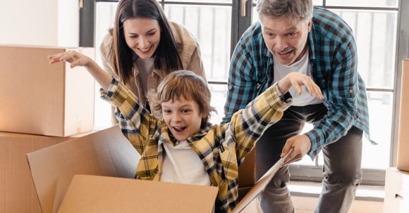 New Home - Kid Having Fun inside the Box