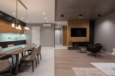 Luxury Properties - Dining room with table and near open plan kitchen