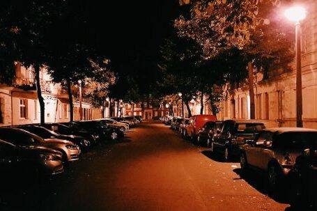 Neighborhood - Assorted Cars Parking on Street during Nighttime