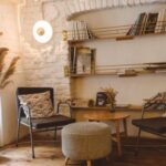 Home - Round Brown Wooden Table Between Two Chairs and Ottoman Chair