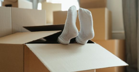 New Home - White Socks on White Paper