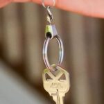 New Home - Person Holding a Keychain with Key