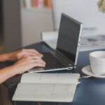 Home Workplace - Person Using Black and Silver Laptop Computer
