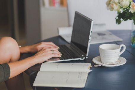 Home Workplace - Person Using Black and Silver Laptop Computer